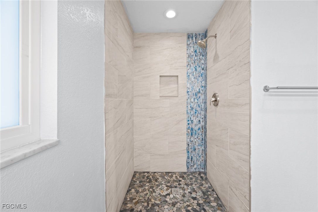 2514 SE 26th Avenue, Cape Coral, FL 33904 Bathroom featuring a shower stall