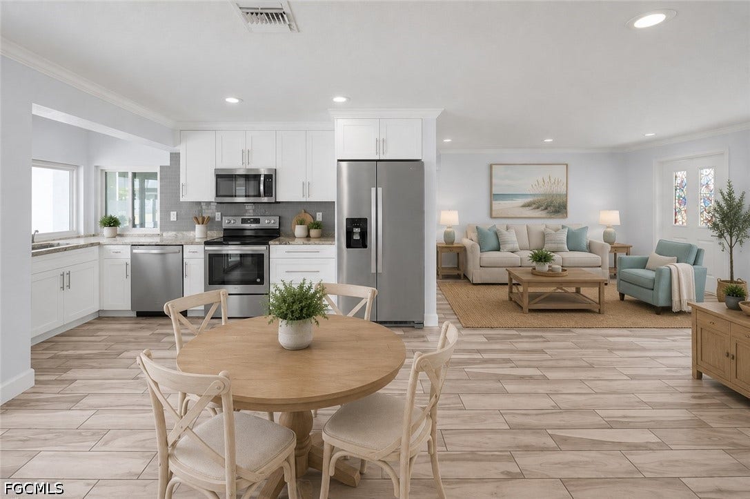 2514 SE 26th Avenue, Cape Coral, FL 33904 Kitchen and dining space. Virtually Staged.