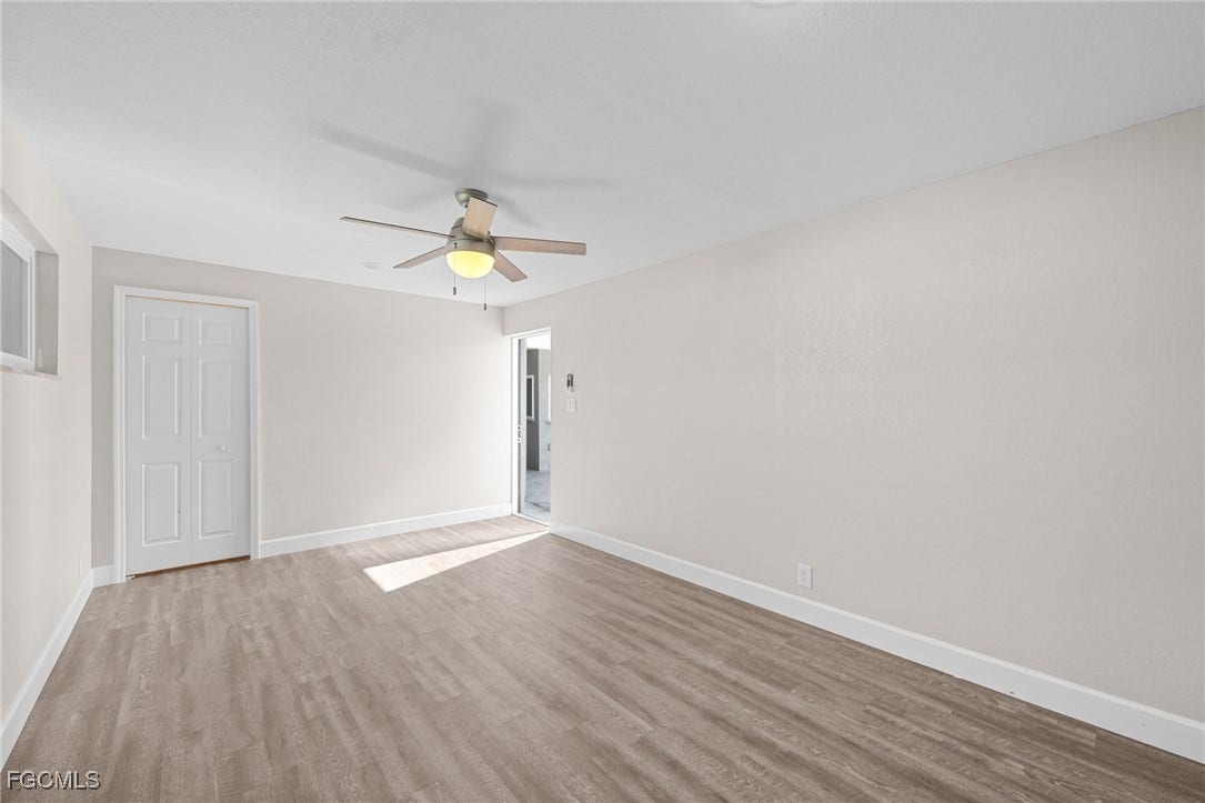 2514 SE 26th Avenue, Cape Coral, FL 33904 Spare room featuring light wood-style floors and ceiling fan