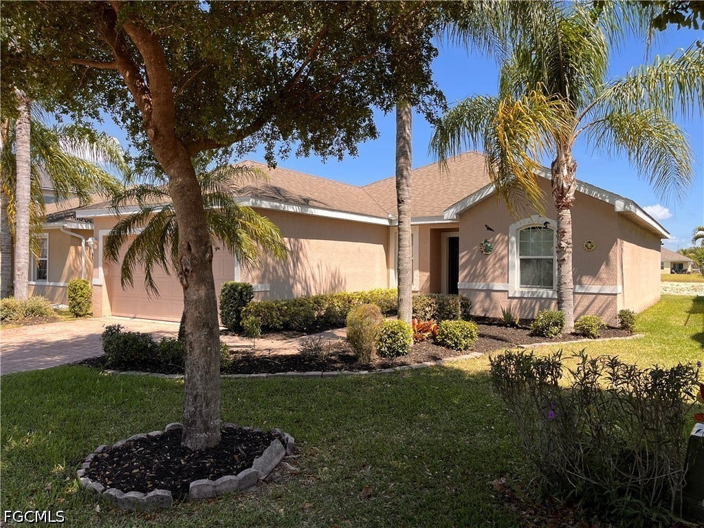 10353 Canal Brook Lane, Lehigh Acres, FL 33936