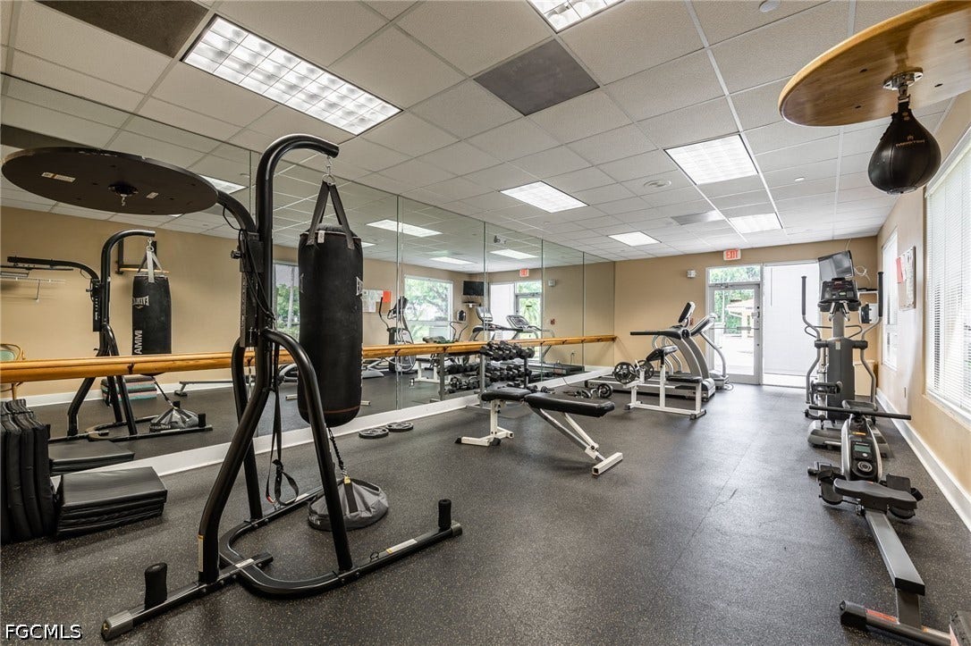 26600 ROSEWOOD POINTE Drive, #B-105, Bonita Springs, FL 34135 Gym with baseboards and a drop ceiling