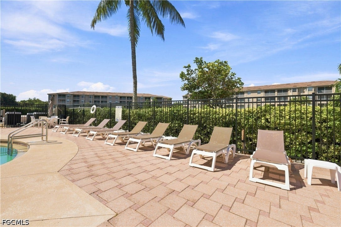 Pool Patio - plenty of chairs surround pool