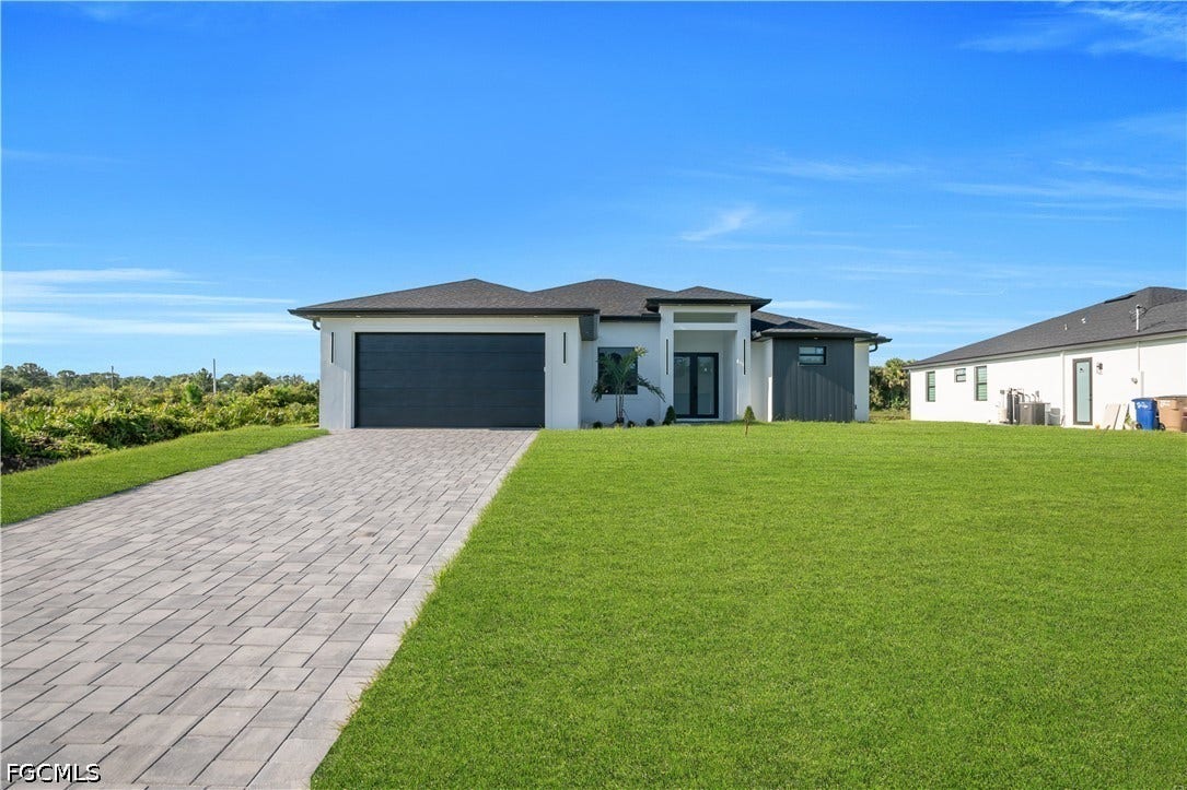 695 Whitmore Loop, Lehigh Acres, FL 33972