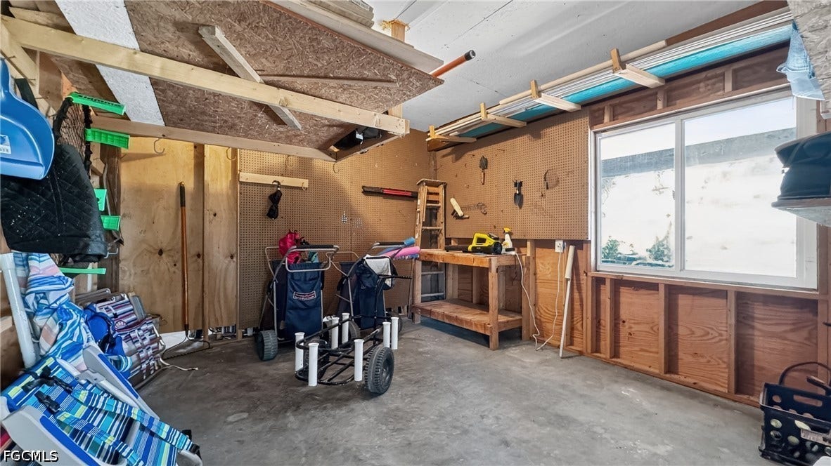 BOTH UNITS HAVE NEARLY IDENTICAL, BIG STORAGE AREAS WITH A BUILT-IN WORK BENCH.