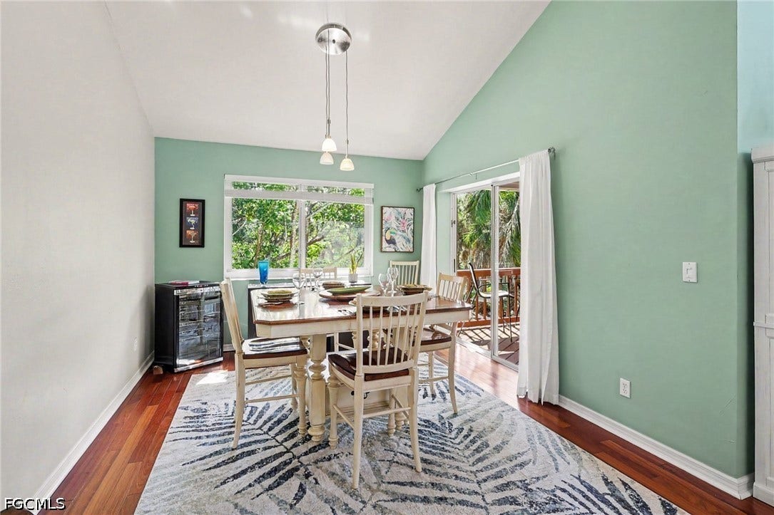 BLUE BAYOU B:  DINING ROOM WITH EASTERN EXPOSURE WINDOW AND SOUTHERN EXPOSURE SLIDING DOORS