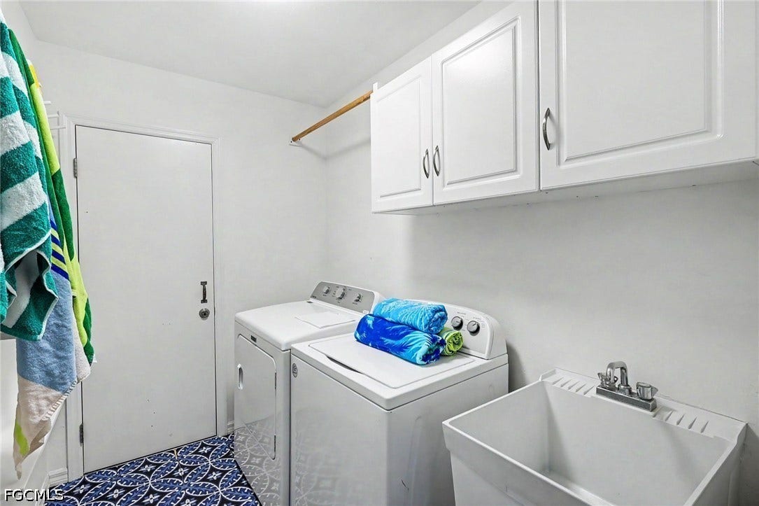 BLUE BAYOU A:  LAUNDRY ROOM W/CONVENIENT UTILITY TUB AND STORAGE