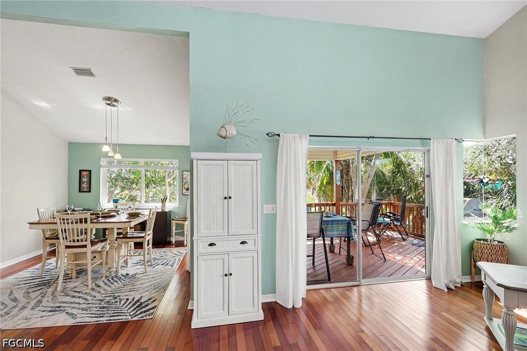 BLUE BAYOU B:  VIEW TOWARDS DINING AND COVERED DECK AREA. EASTERN EXPOSURE.
