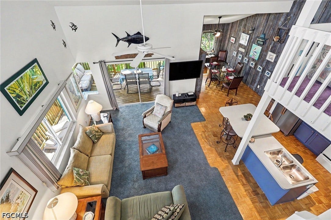 BLUE BAYOU A:  VIEW FROM LOFT AREA INTO MAIN LIVING ARTEA