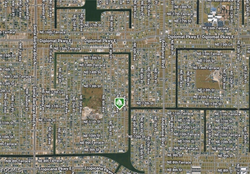 Map. An overhead satellite view displaying the property's location within a grid of streets and waterways