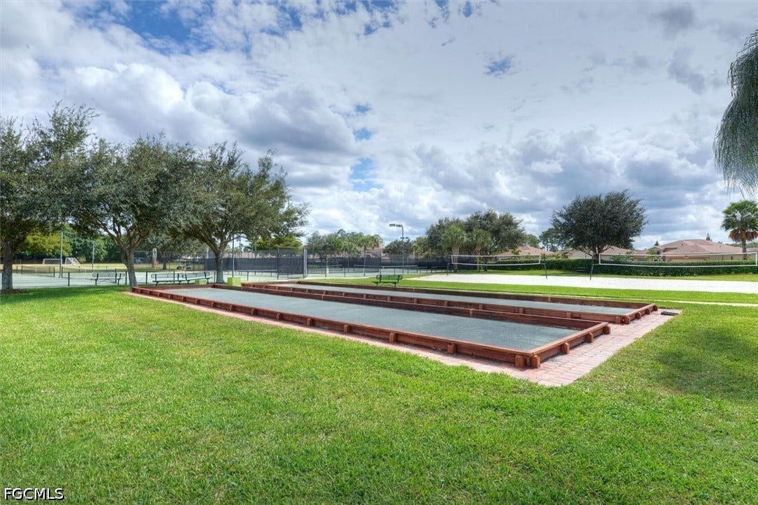 Community bocce ball courts with paver surrounds