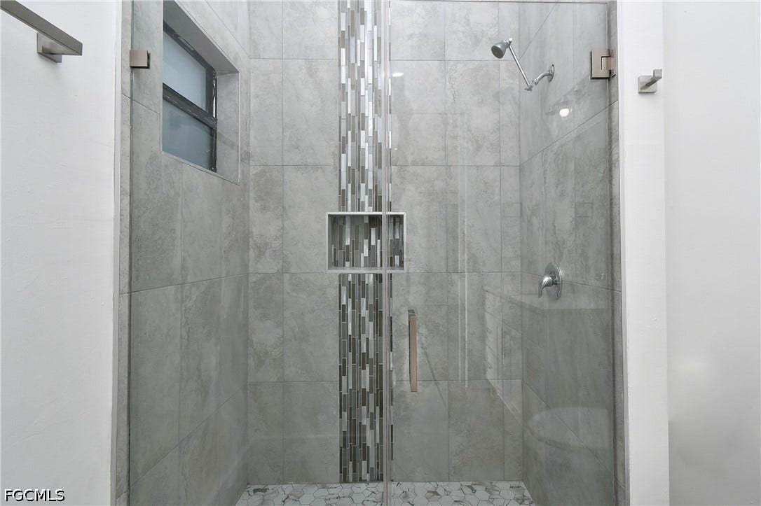 Bathroom featuring a stall shower