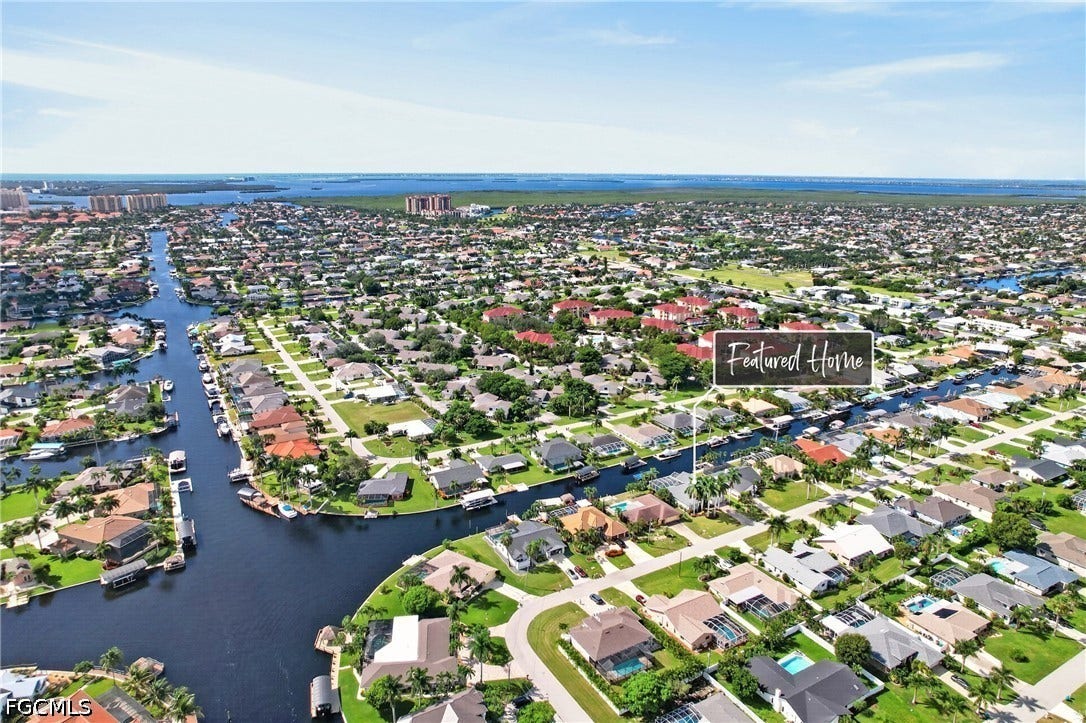 1416 SW 49th Terrace, Cape Coral, FL 33914 Canal-front property with direct water access