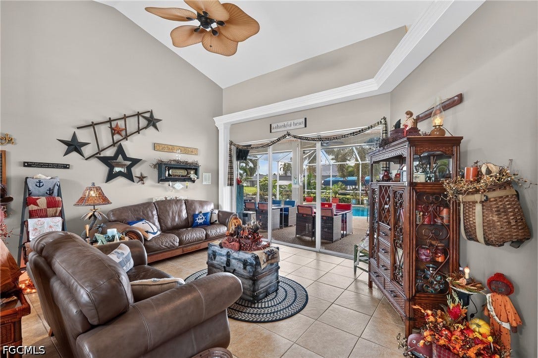1416 SW 49th Terrace, Cape Coral, FL 33914 This room could be used for formal dining, gathering room, formal living or game room that opens out to the lanai - Cathedral ceiling with a ceiling fan