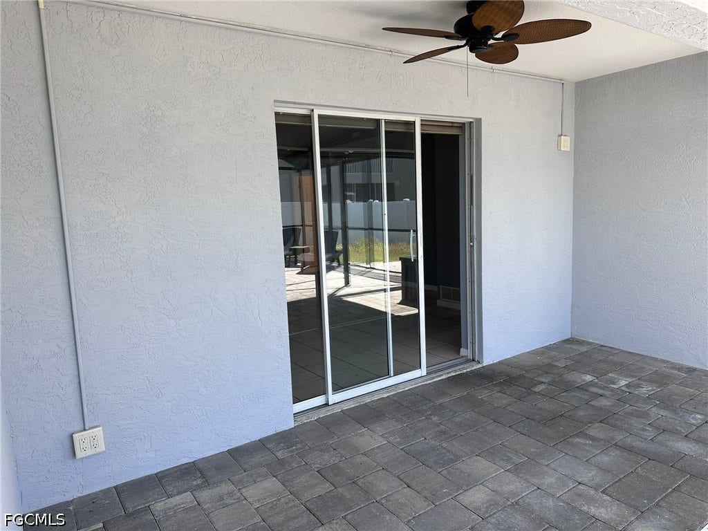 2926 SE Santa Barbara Place, Cape Coral, FL 33904 Covered patio with paver flooring