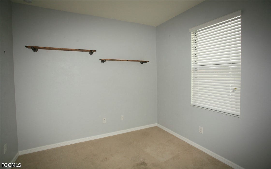 14495 Vindel Circle, Fort Myers, FL 33905 Recessed window with horizontal blinds