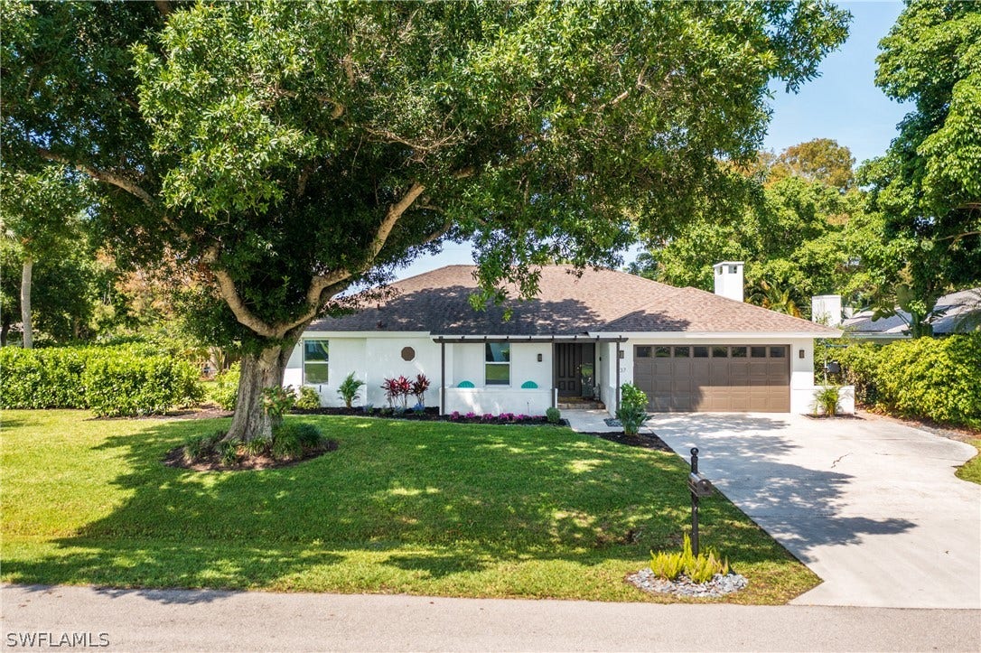 237 Burning Tree Drive, Naples, FL 34105