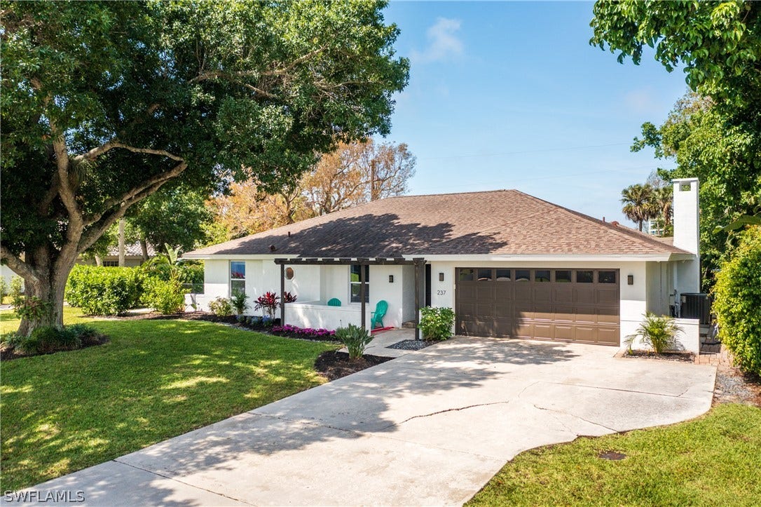 237 Burning Tree Drive, Naples, FL 34105