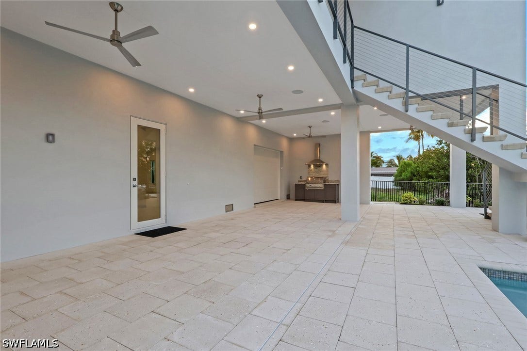 215 1st Street, Bonita Springs, FL 34134 Poolside Patio and seating area