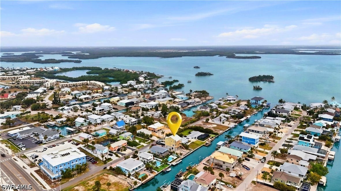 View of urban area with a large body of water - Virtually Edited Image