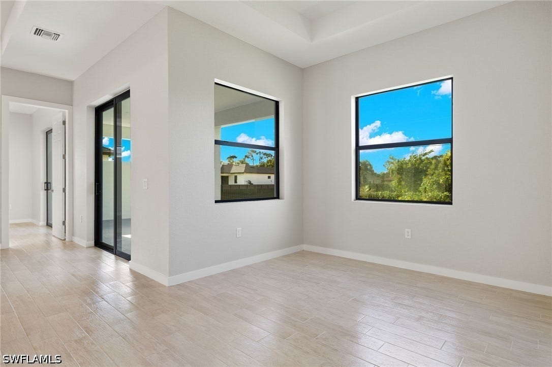 Flooring upgraded to premium, color-matched Luxury Vinyl Plank [LVP].