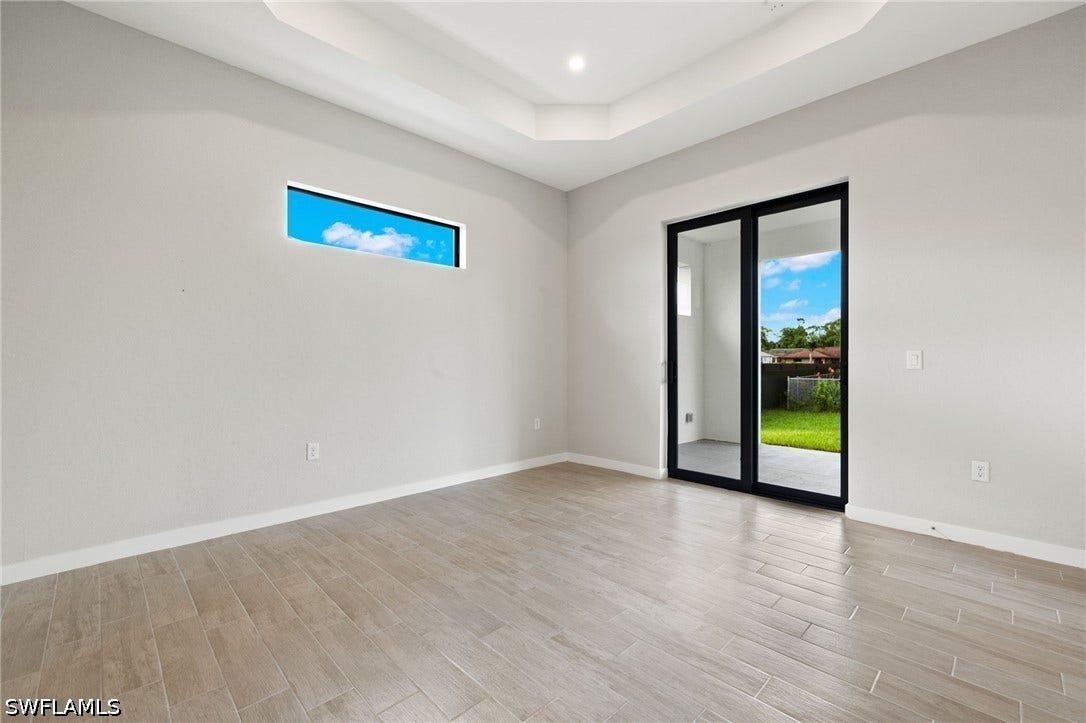 Flooring upgraded to premium, color-matched Luxury Vinyl Plank [LVP].
