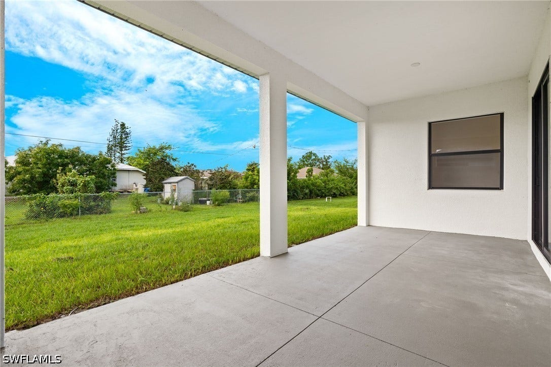 4713 6th Street W, Lehigh Acres, FL 33971 Extended lanai with outdoor kitchen hookup