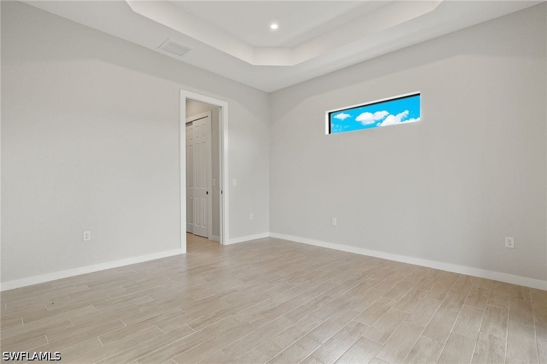 Flooring upgraded to premium, color-matched Luxury Vinyl Plank [LVP].