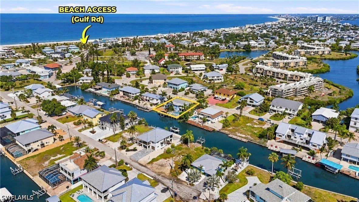 Coastal community featuring direct canal access, private boat docks, and proximity to Gulf beaches - Virtually Edited Image