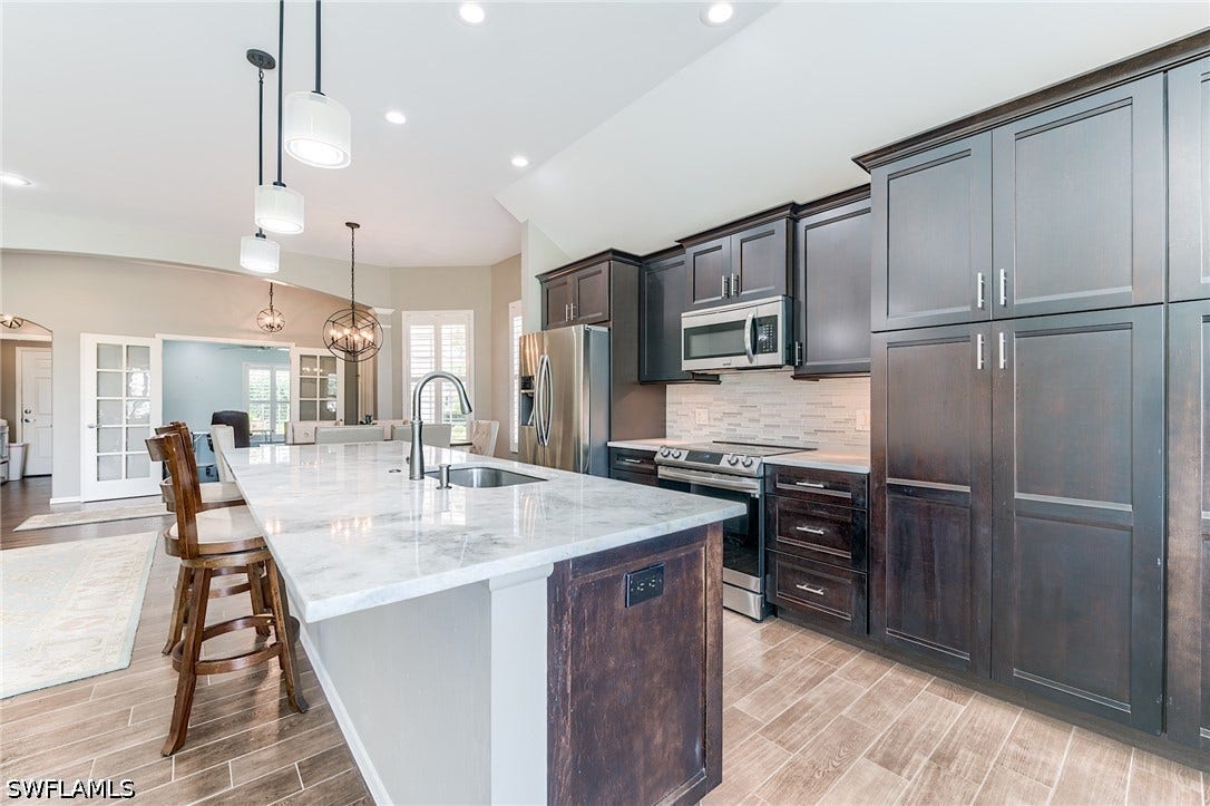 9053 Spring Run Boulevard, Estero, FL 34135
