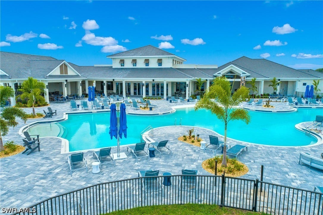 Social club features resort style pool, indoor formal dining, outdoor patio/lakeside dining, lake side beach, volleyball, community room, ping pong, beach fire pits, and so much more!