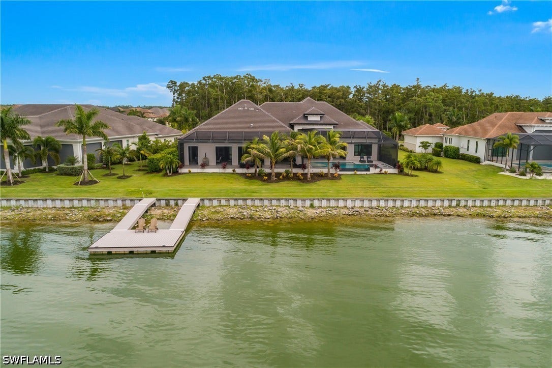 Enjoy 1900 square feet of outdoor living lanai space, and nearly 150' of lake frontage.