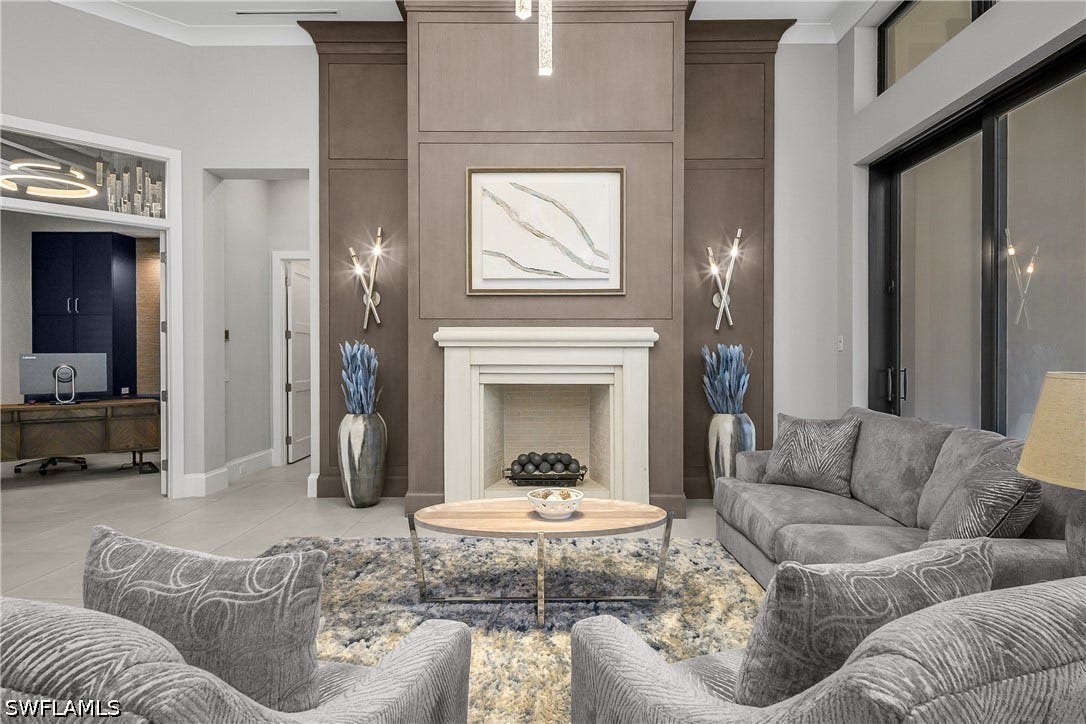One of FOUR fireplaces located in the social gathering space.