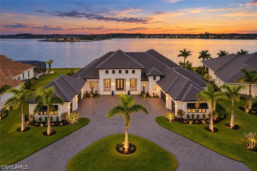 This Custom built Stock Home sits on an estate sized lot on Blue Eye Loop's gated peninsula of WildBlue. This one of a kind home features the best western sunsets, long lake views, and luxury around every corner.