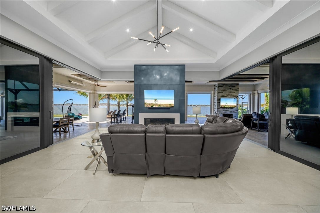 With zero-corner sliders and pocketing doors fully open, the interior and expansive lanai blend effortlessly into one incredible indoor-outdoor living space.