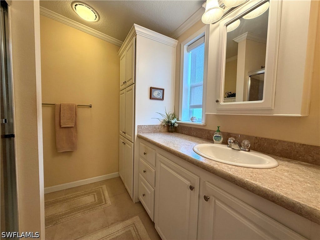4521 Sawmill Drive E, Estero, FL 33928