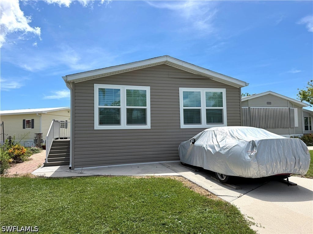 4521 Sawmill Drive E, Estero, FL 33928