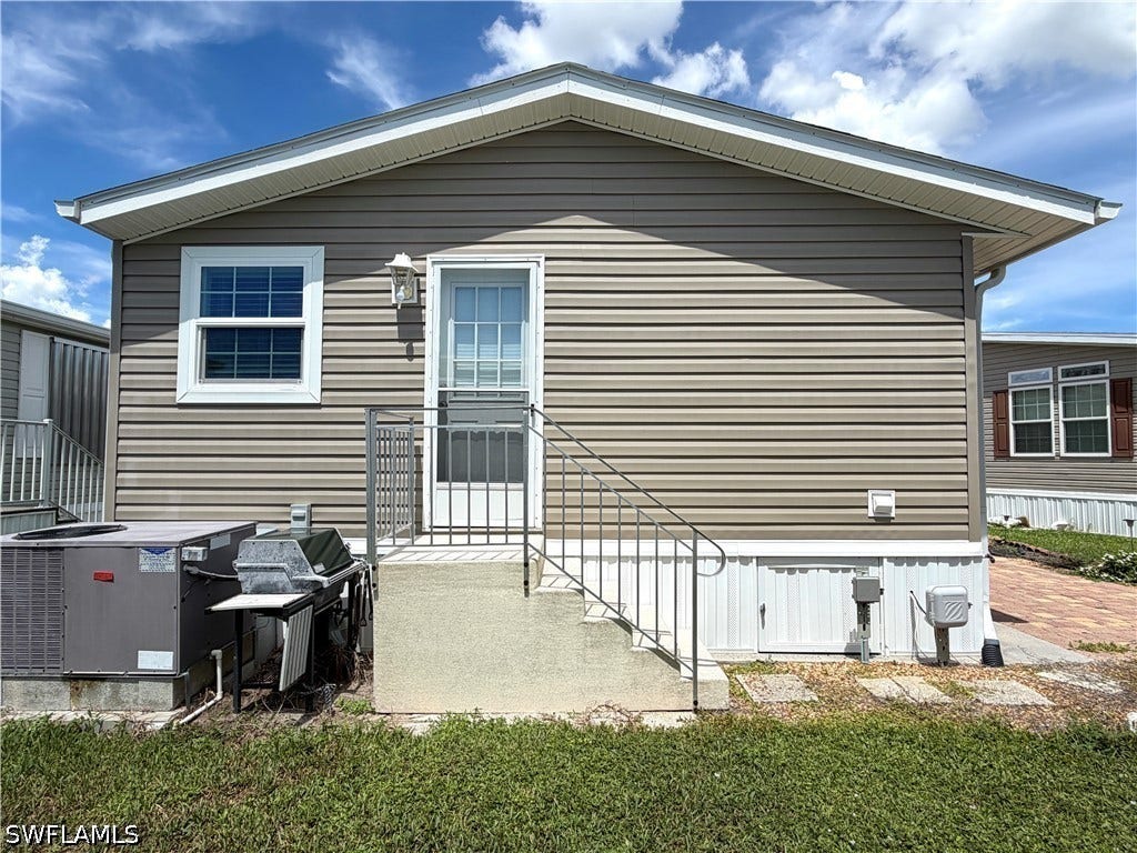 4521 Sawmill Drive E, Estero, FL 33928