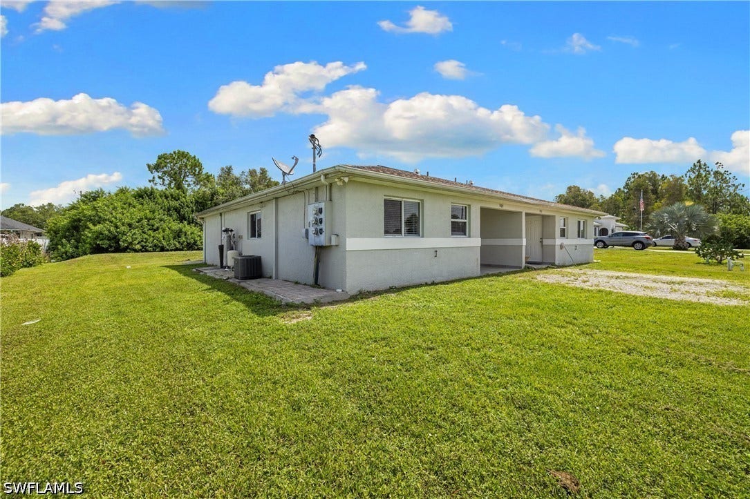 909/911 Jaguar Boulevard, Lehigh Acres, FL 33974 909/911 Jaguar Boulevard, Lehigh Acres, FL 33974