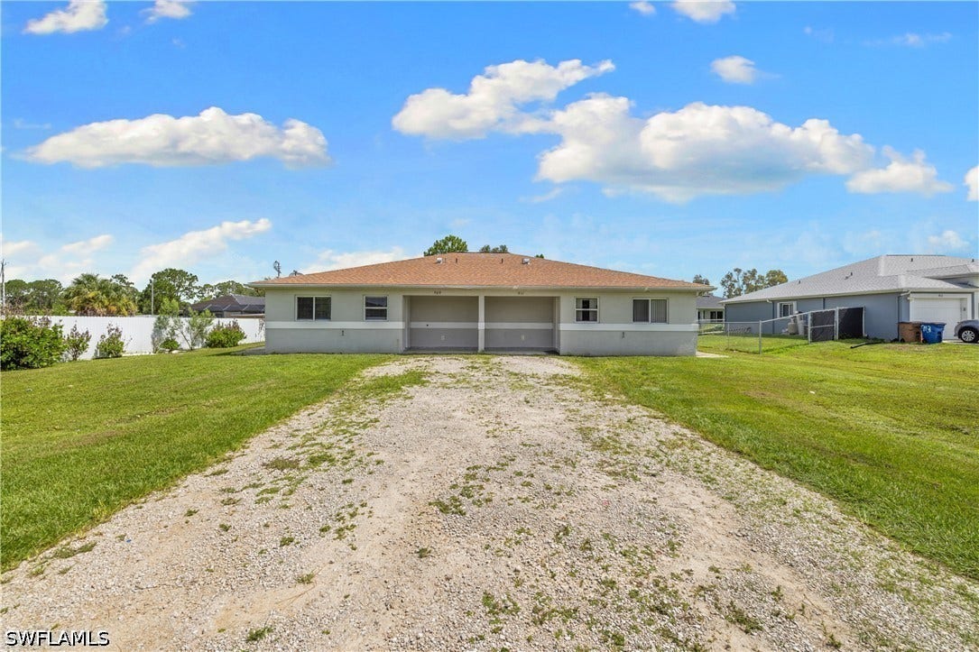 909/911 Jaguar Boulevard, Lehigh Acres, FL 33974 909/911 Jaguar Boulevard, Lehigh Acres, FL 33974