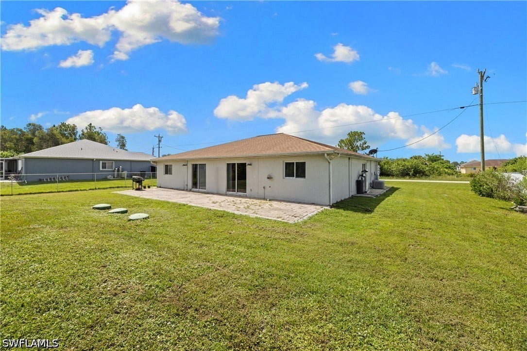 909/911 Jaguar Boulevard, Lehigh Acres, FL 33974 909/911 Jaguar Boulevard, Lehigh Acres, FL 33974