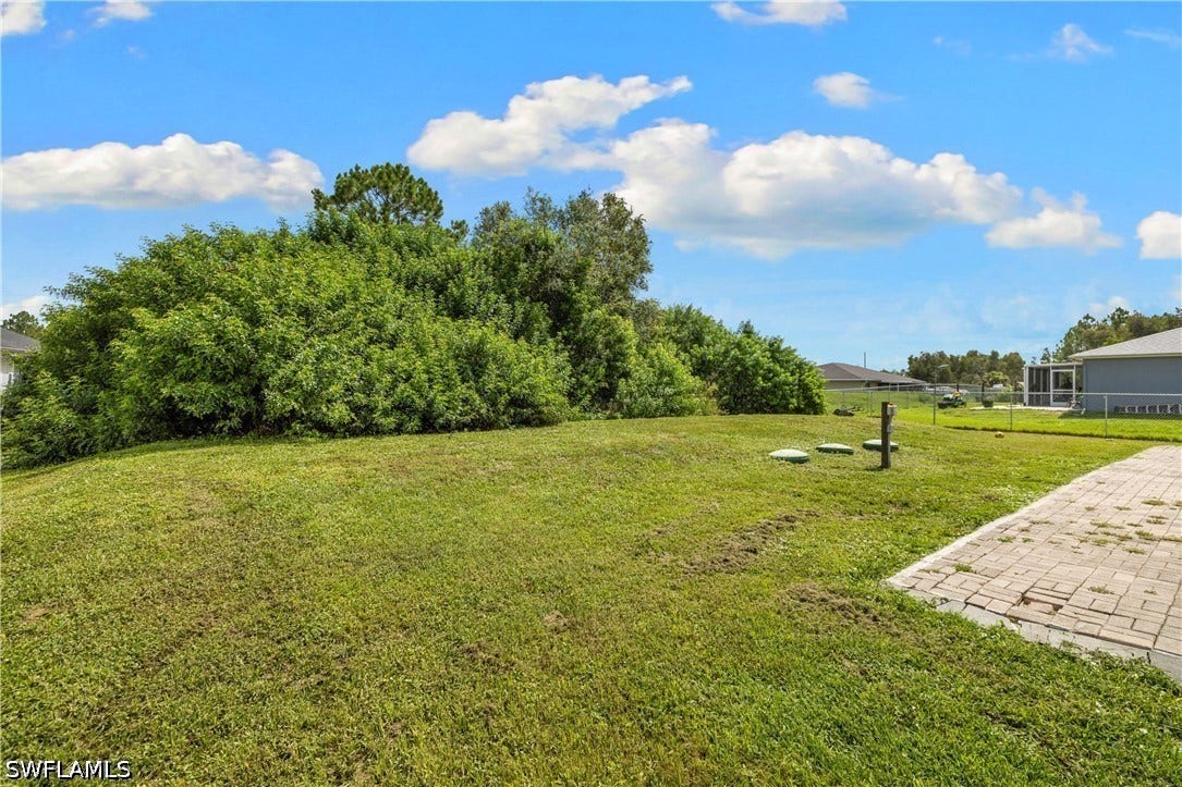 909/911 Jaguar Boulevard, Lehigh Acres, FL 33974 909/911 Jaguar Boulevard, Lehigh Acres, FL 33974
