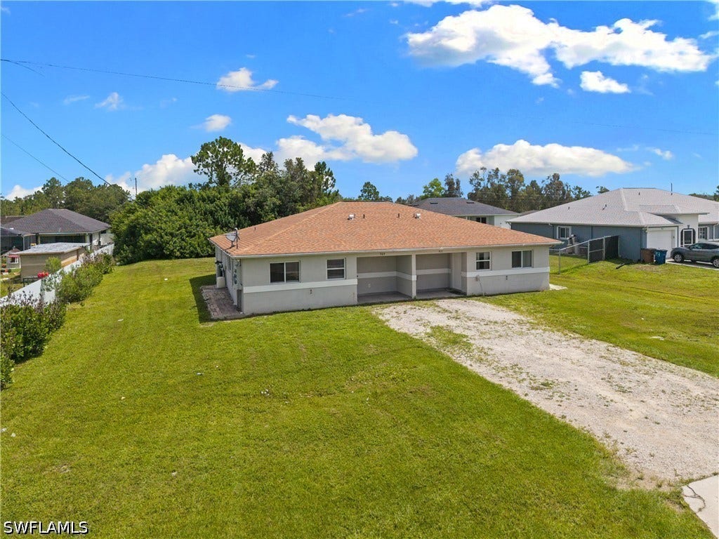 909/911 Jaguar Boulevard, Lehigh Acres, FL 33974 909/911 Jaguar Boulevard, Lehigh Acres, FL 33974