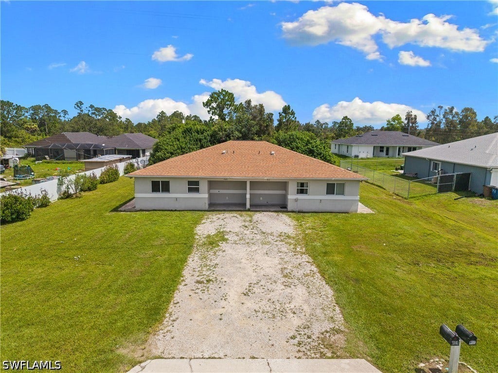 909/911 Jaguar Boulevard, Lehigh Acres, FL 33974 909/911 Jaguar Boulevard, Lehigh Acres, FL 33974