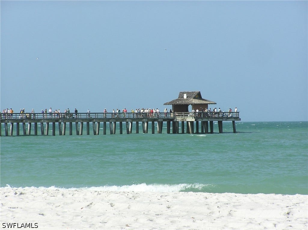 The iconic Naples Pier is being restored after Hurricane Ian and is scheduled to open again next year.