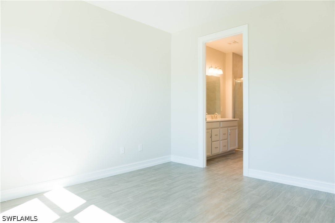 1050 ENBROOK Loop, Naples, FL 34114