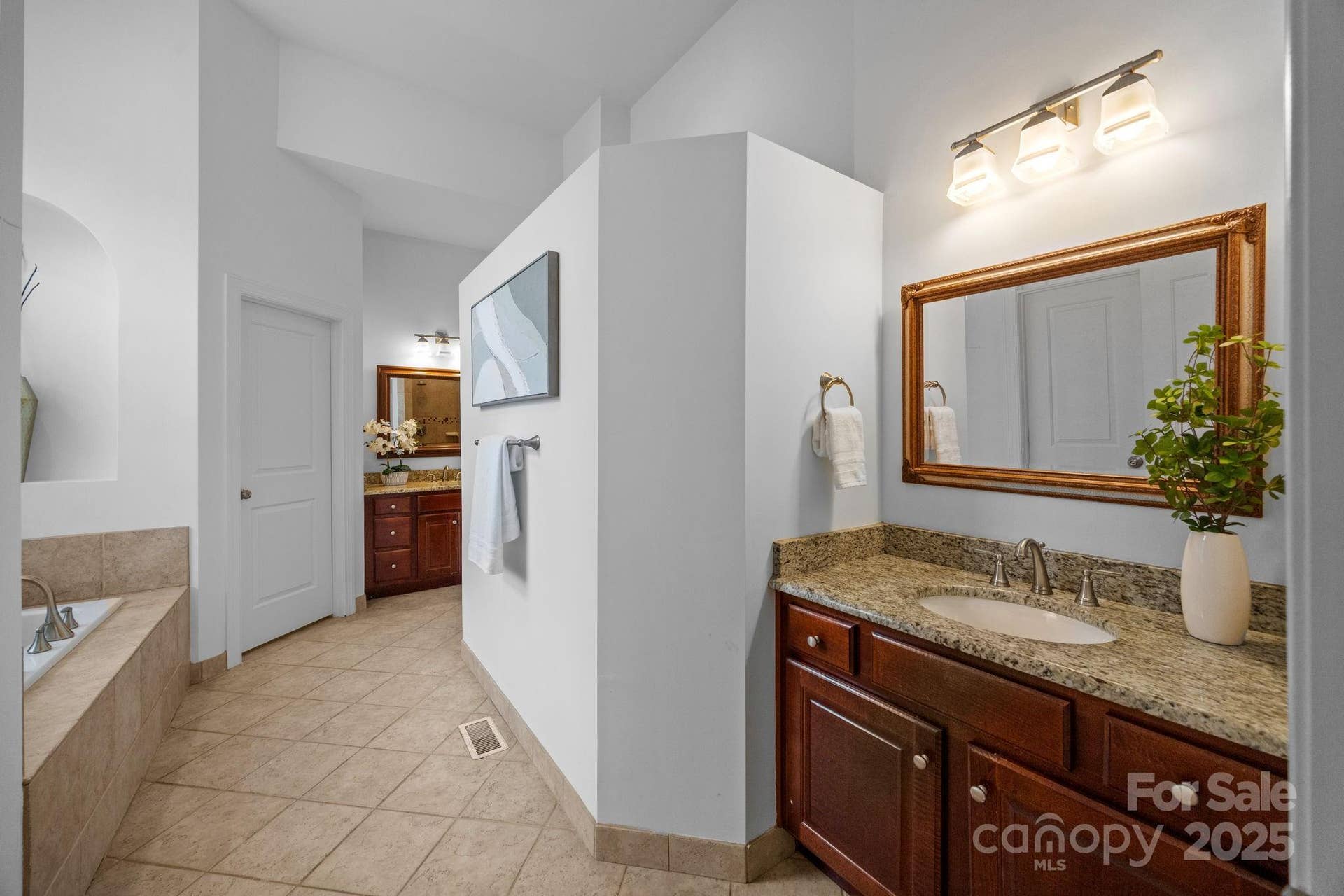 Master bathroom with dual vanities