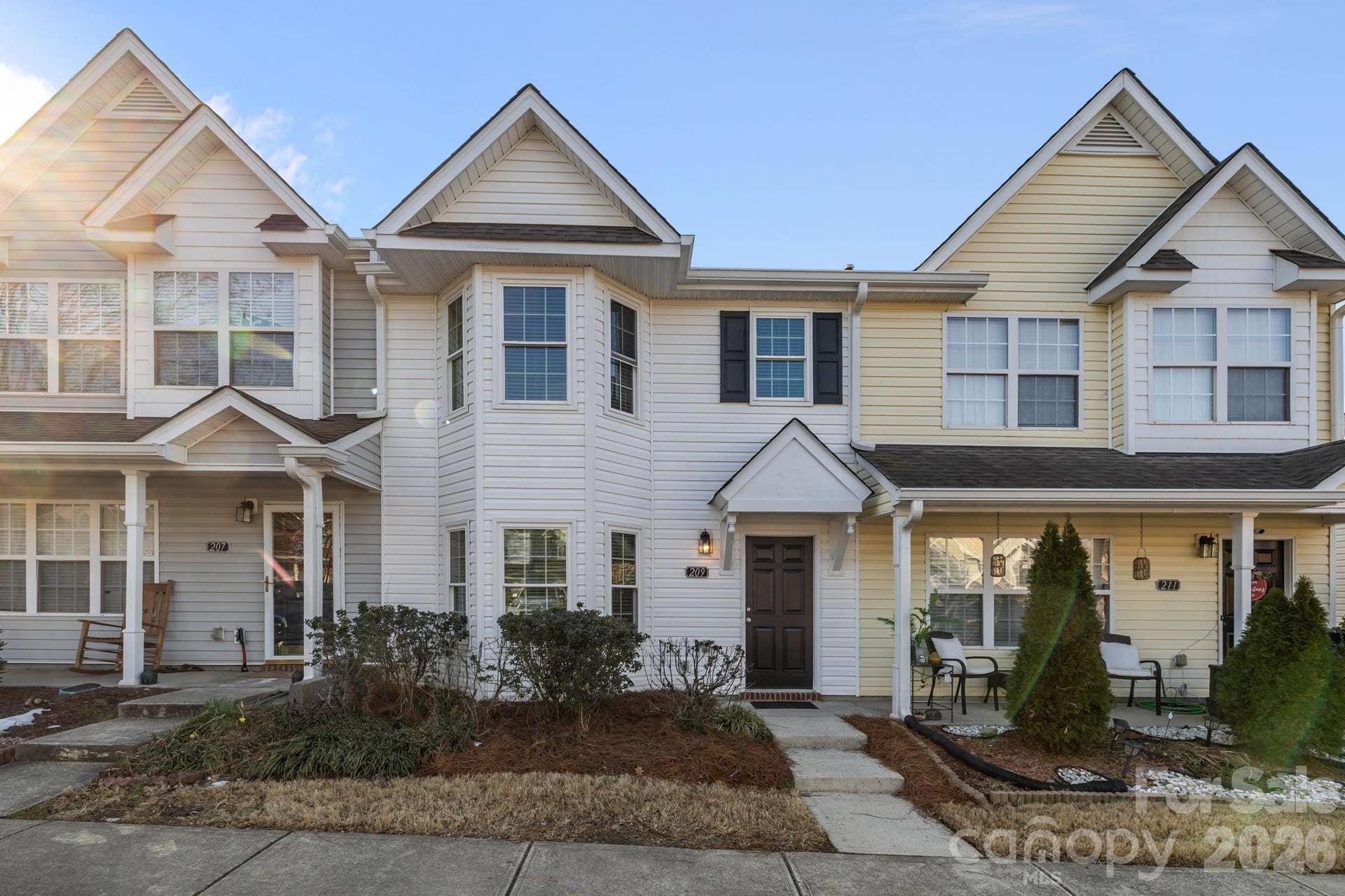 Welcome to 209 Primrose Walk in Fort Mill's established Cole Creek townhome neighborhood minutes from Pineville.