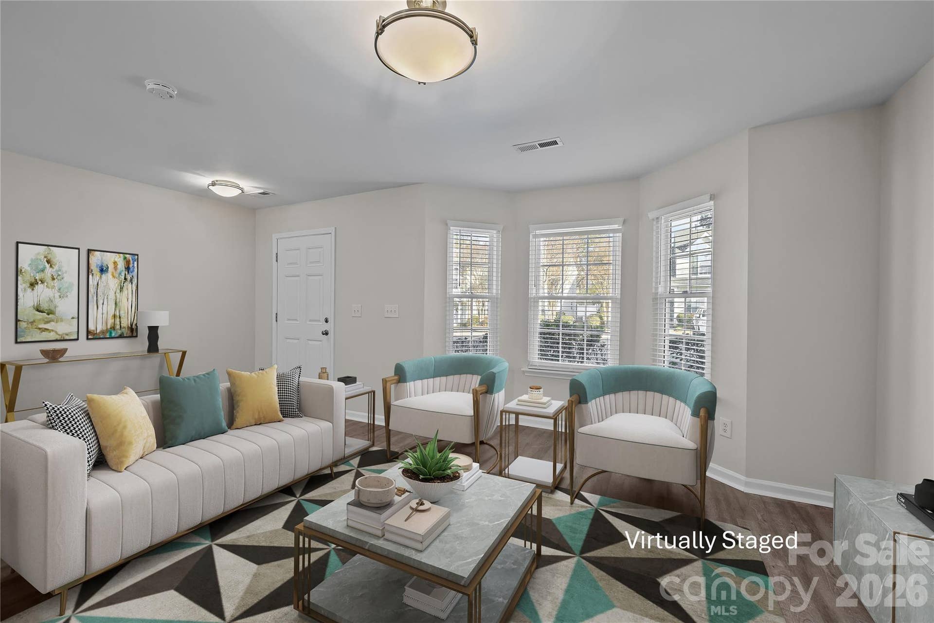 Bay window in living room provides architectural character, dimension, visual interest, and lots of natural light.