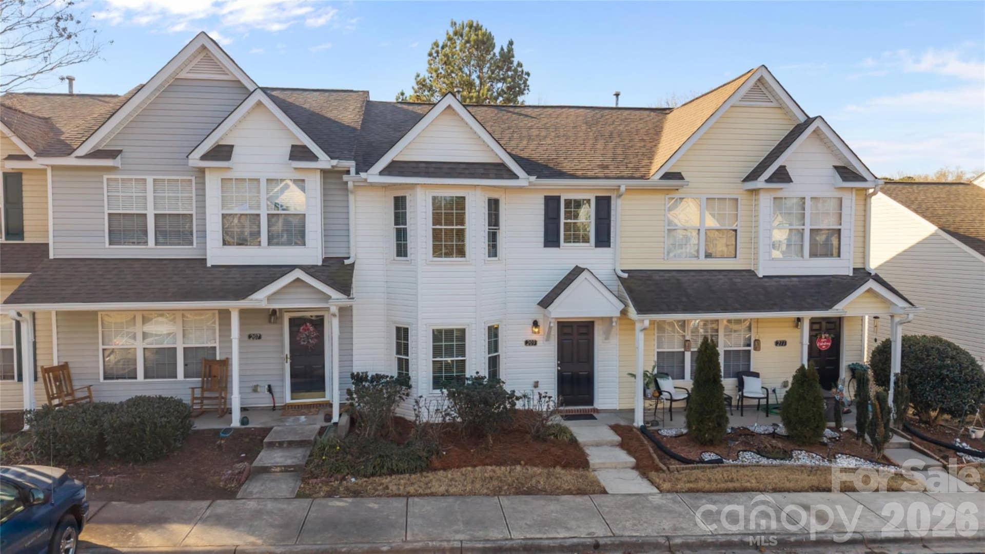 Bay windows on both levels of the home add architectural interest and curb appeal. Home's siding and entrancy recently pressure washed.