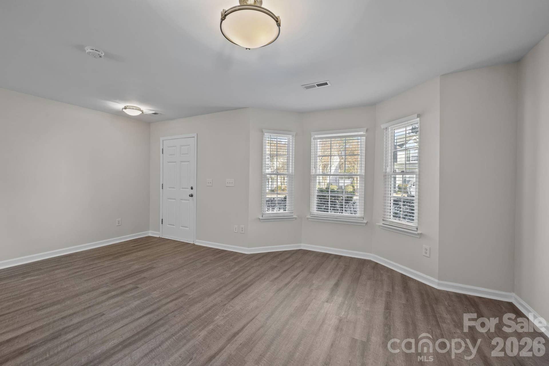 Spacious entry and living room. Freshly painted.